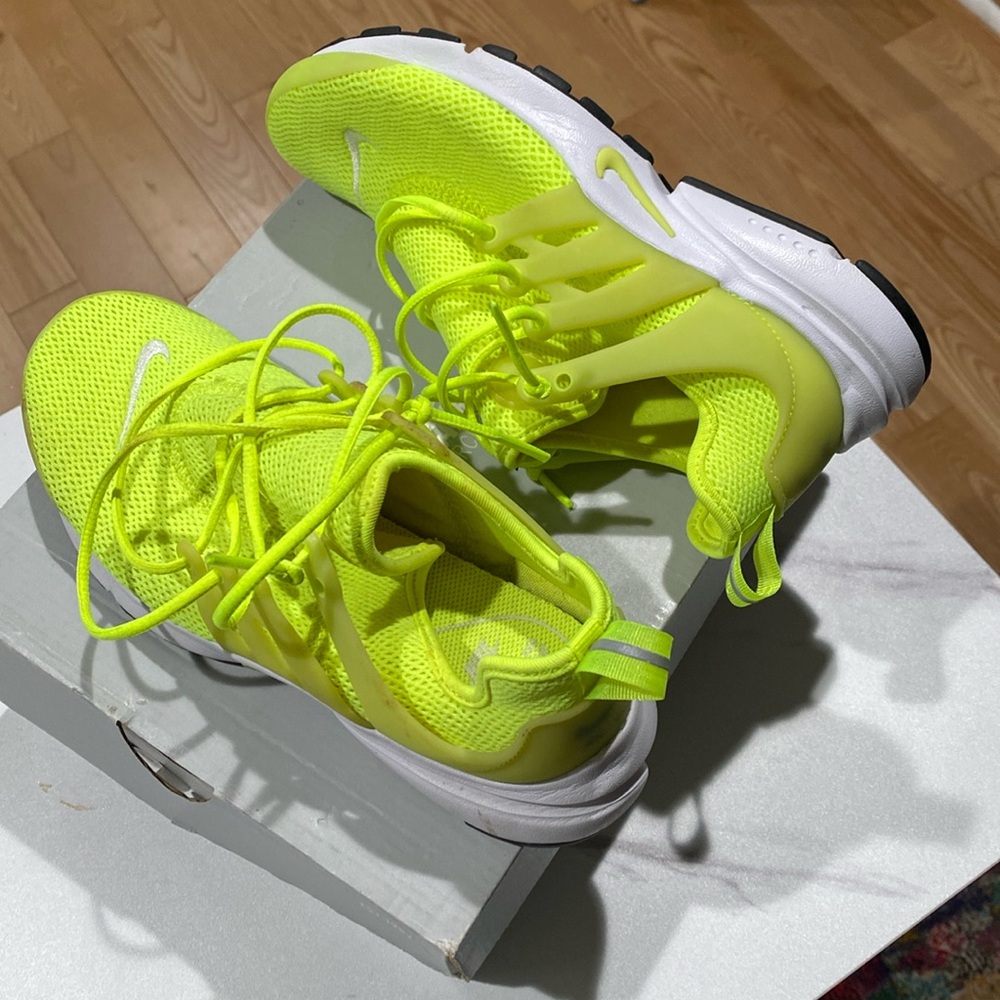 Neon green Nikes Size 6. Worn once and in great shape.